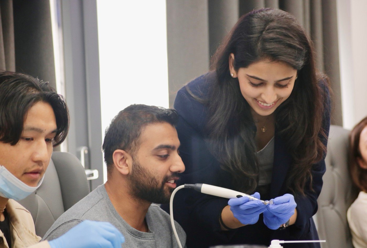 Dr. Goel demonstrating instrumentation to course delegates