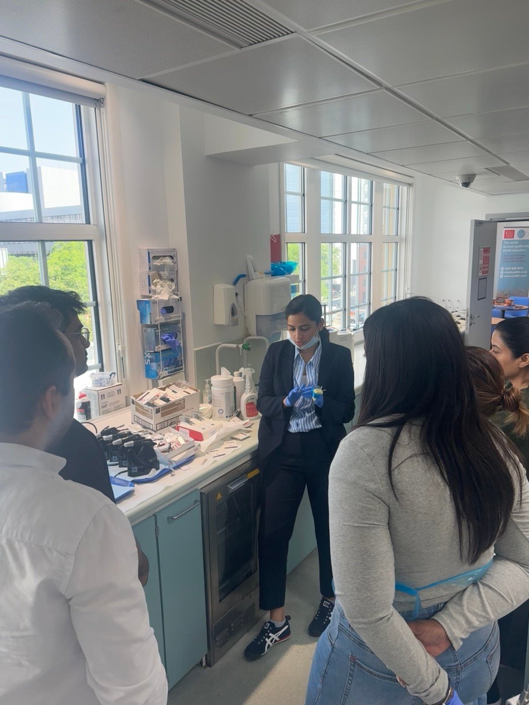 Dr. Goel teaching a group at LonDEC