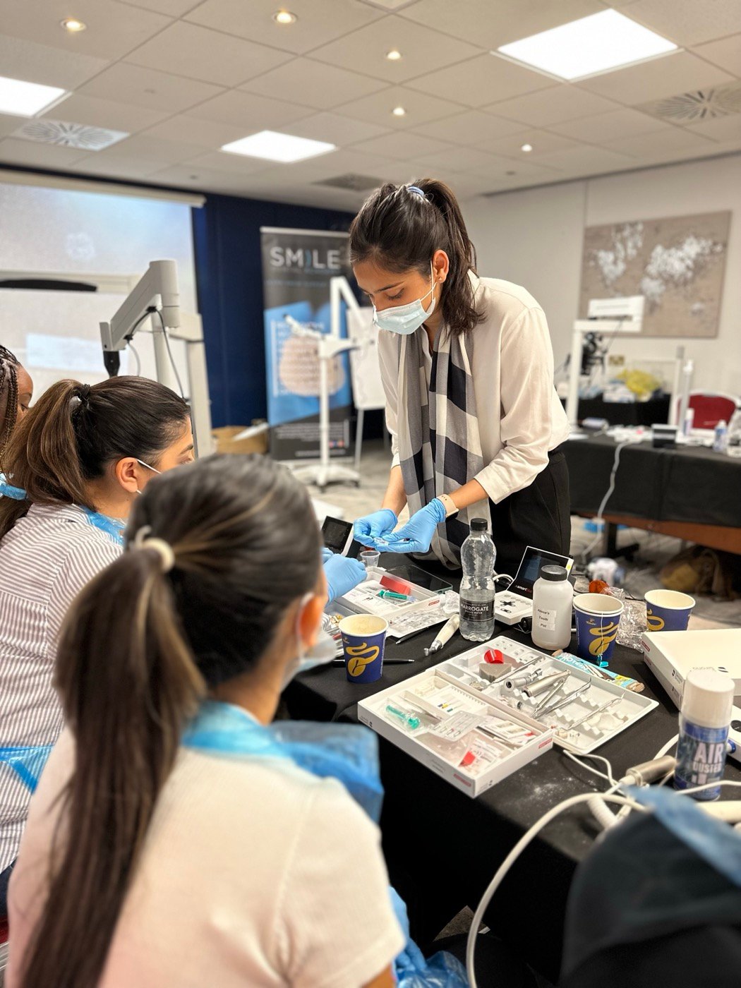 Dr. Goel demonstrating at the teaching bench